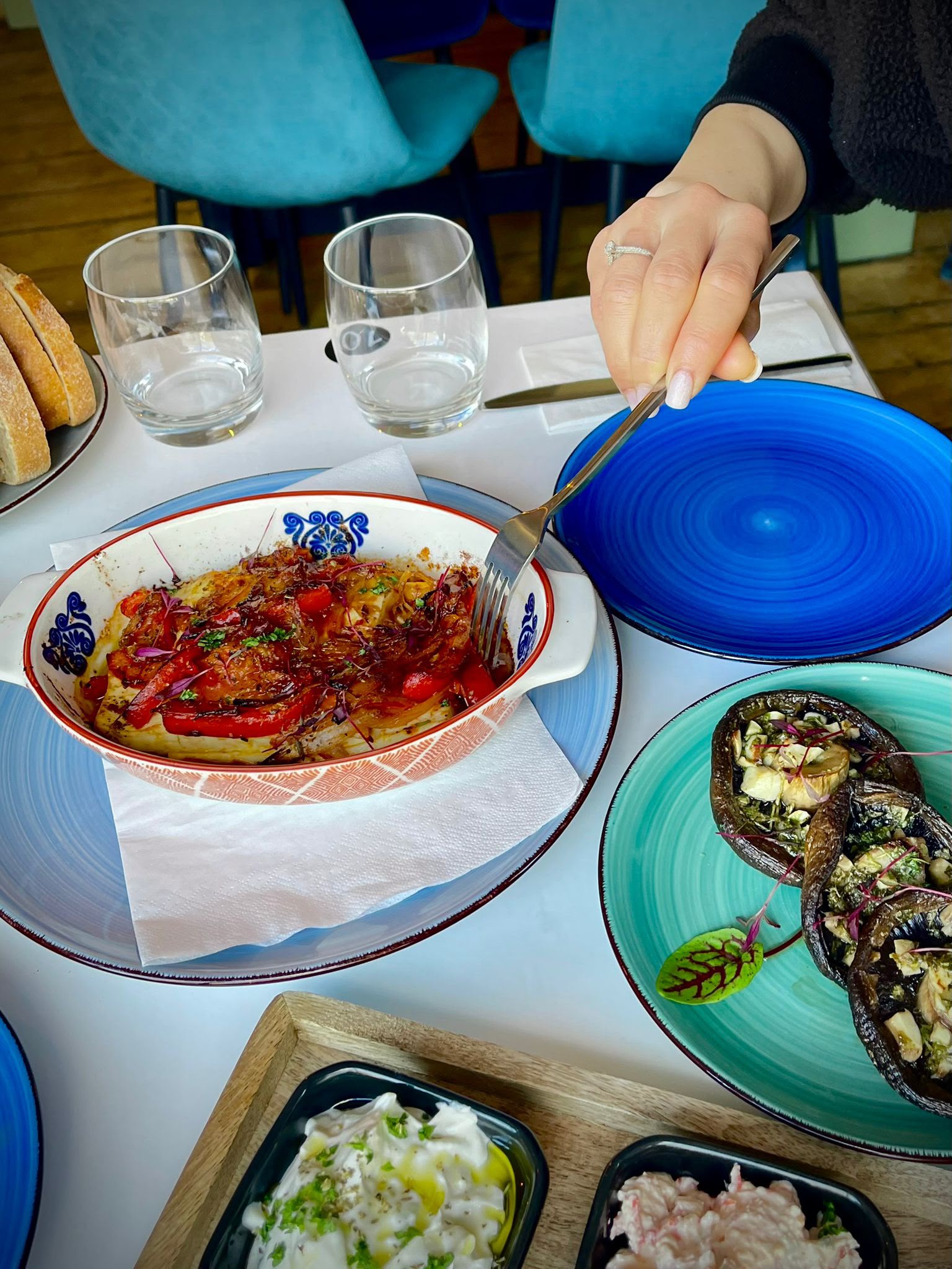 Restaurant dishes at the table at Soleá